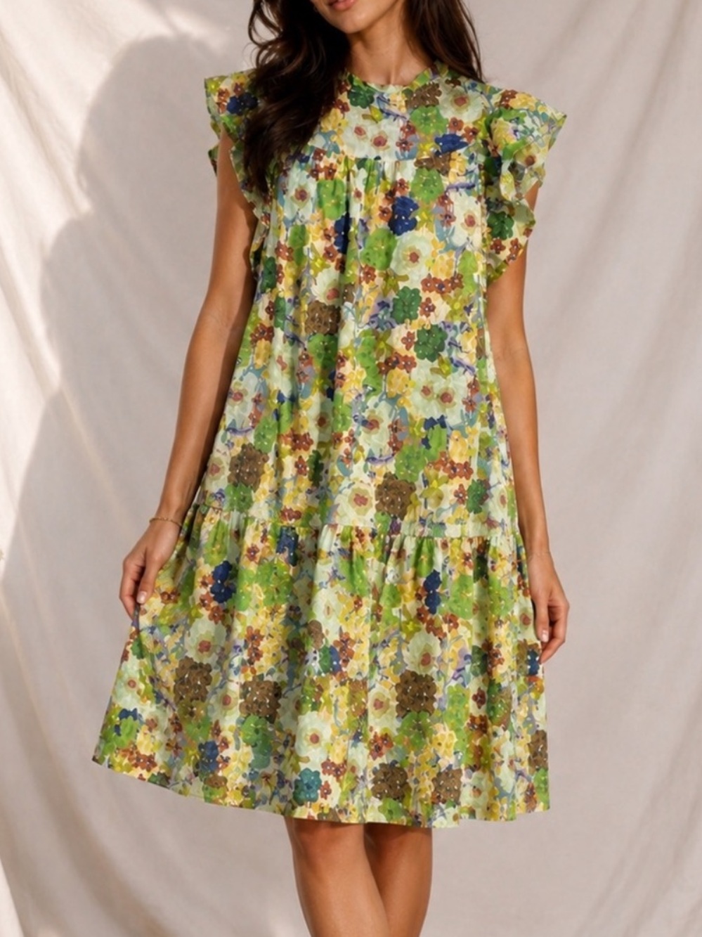 floral dress, featuring ruffle sleeves and a tiered skirt medium
